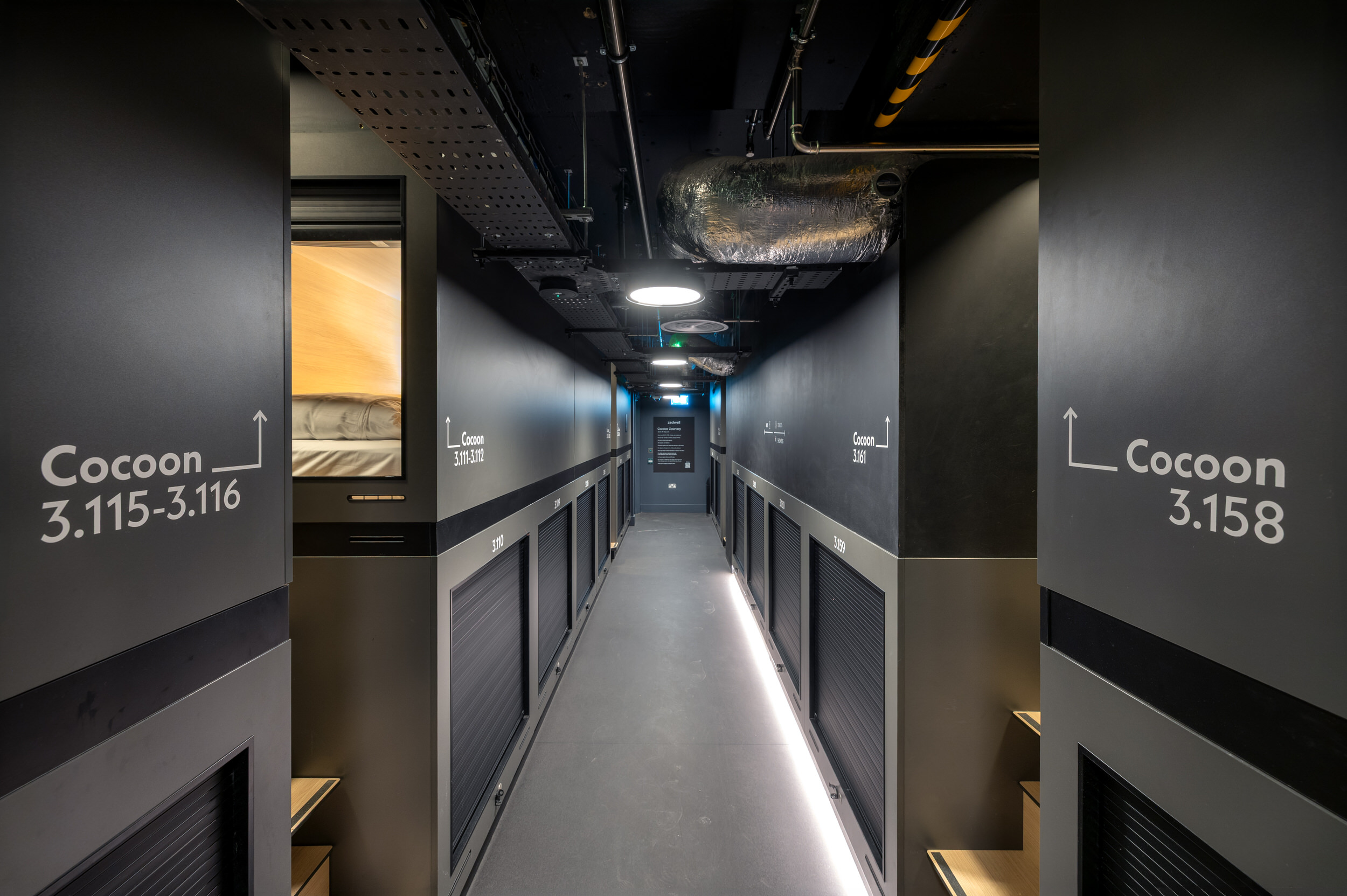 Zedwell Park Lane — completed Cocoon room corridor with concealed services