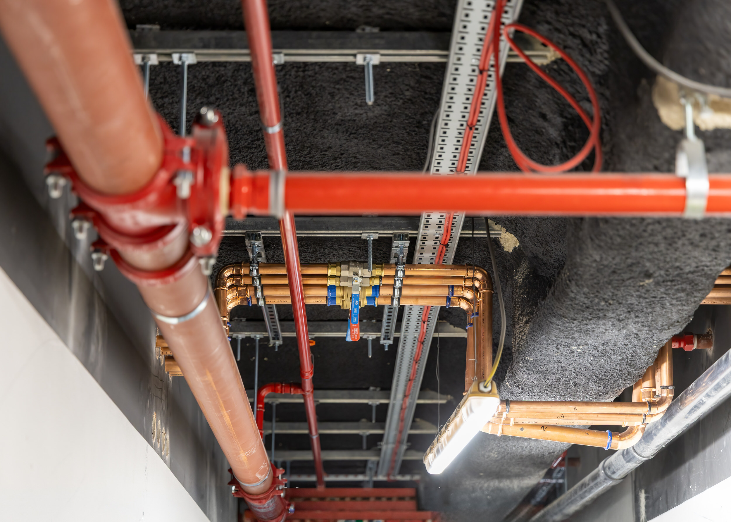 Above-ground drainage and copper water services installed at high level